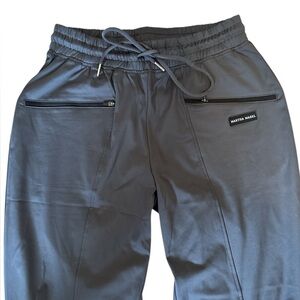 Scrubs Grey Jogger Sz Small. 
14” waist with an extra 3” of stretch
Martha Mabel